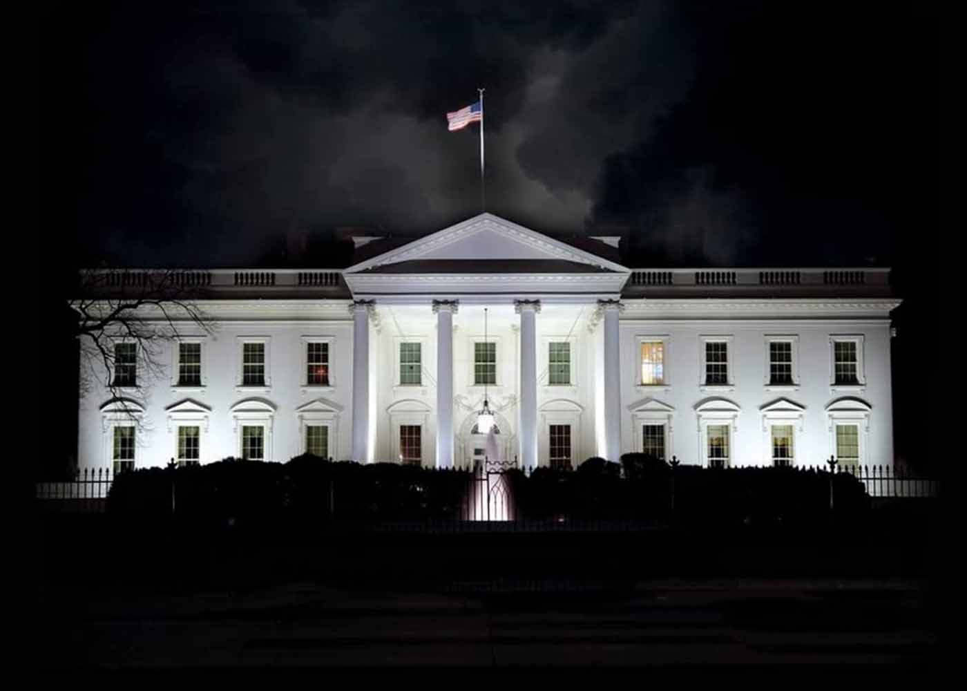 Enlarged picture of the White House at night, as from the cover of Elixir, by Phil Cleary